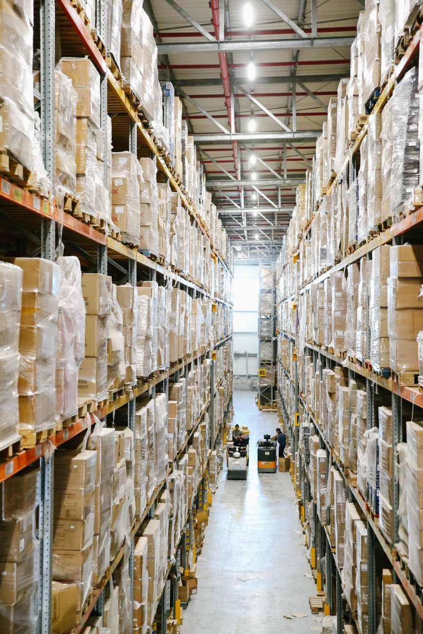 boxes on shelves inside a warehouse