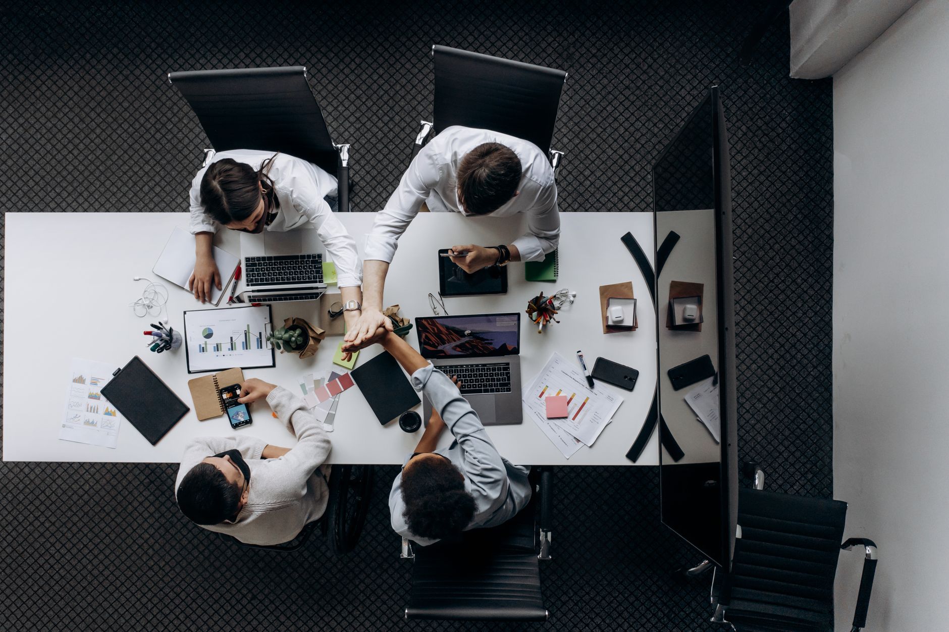 people sitting around the conference table
